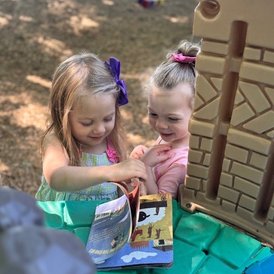two kids playing outside